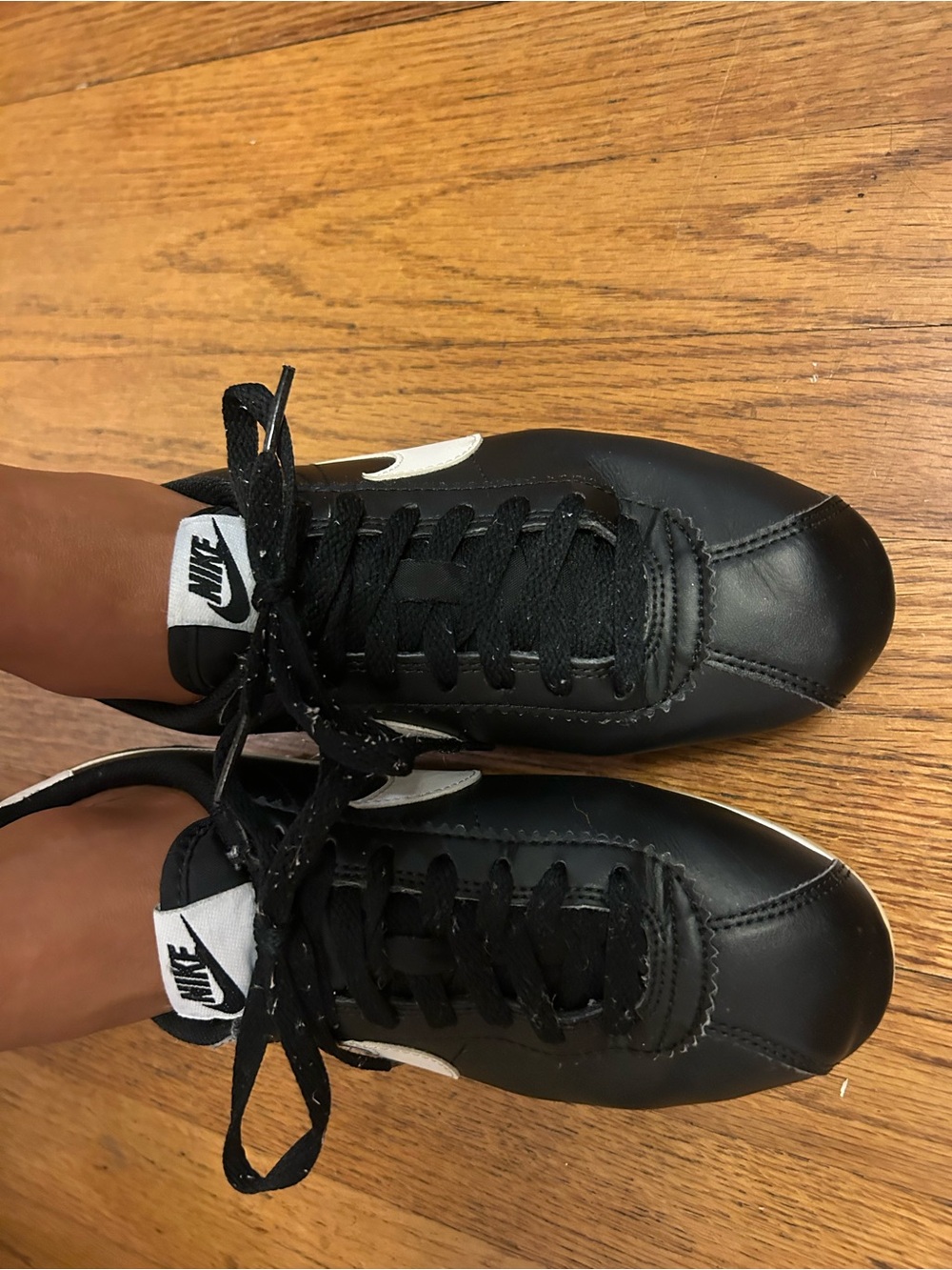 Nike Black Leather Athletic Shoes with White Swoosh